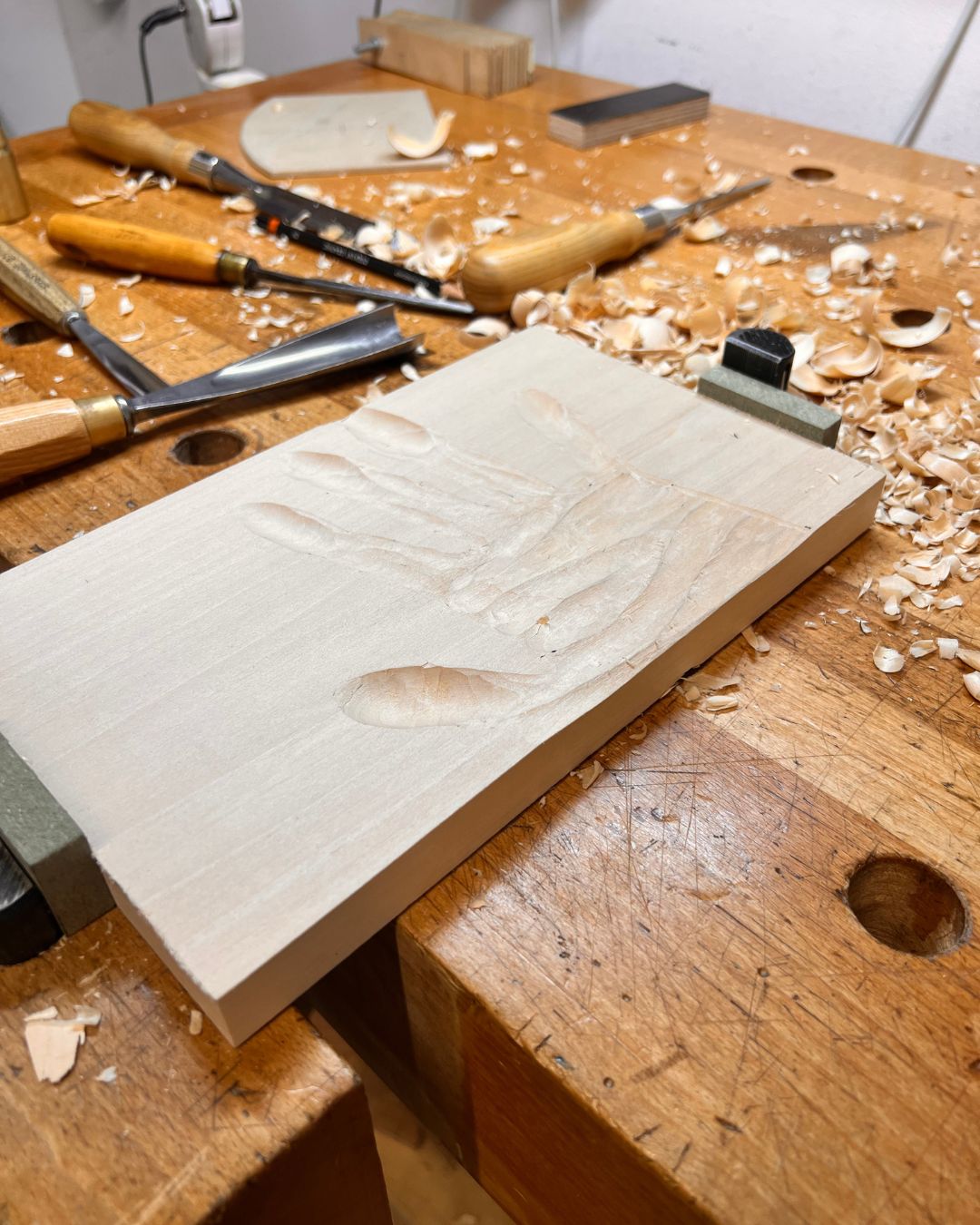 Creative handprint relief carving made by a Designer Maker student