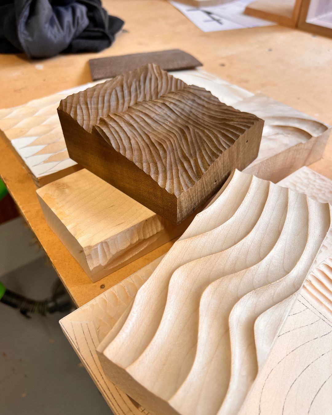 Example relief-carving blocks from the Waters and Acland workshop