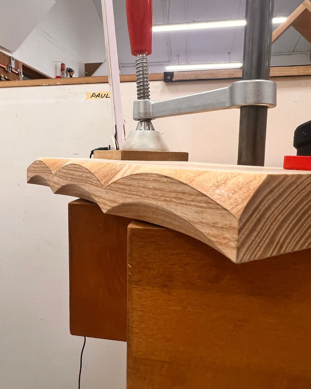 Hand-shaped curved and tapering profiles on a timber practice board